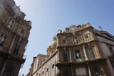 an old building with a blue sky in the background at A casa di Alex in Palermo