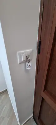a door with a lock on it next to a door at Il quaRtetto apartment in Palermo