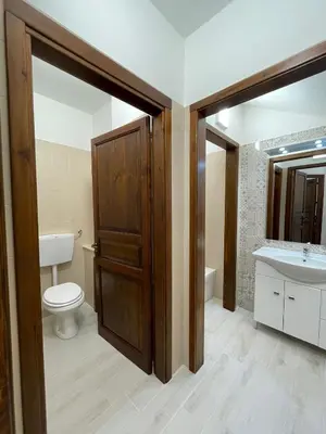a bathroom with a toilet and a sink at Civico 356 in Castellammare del Golfo