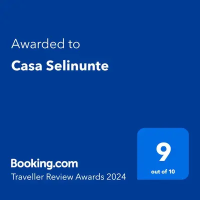 a screenshot of a cell phone with the text awarded to csa software at Casa Selinunte in Palermo