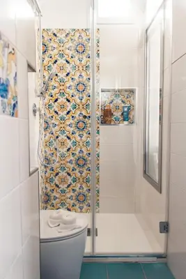a bathroom with a shower and a toilet at Pensiero Speciale in Alcamo