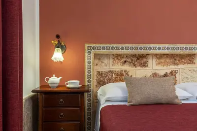 a bathroom with a toilet and a shower at B&B L'Angolino della nonna in Castelluzzo
