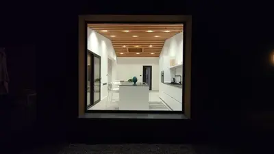a view of a kitchen through a mirror at Casa di Pino in Cefalù
