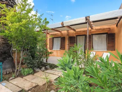 a house with a garden in front of it at Holiday Home Acquamarina Gaia by Interhome in San Vito lo Capo