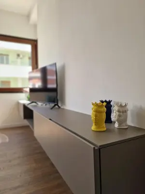 a desk with two pairs of yellow shoes on it at SPRING APARTMENTS in Palermo
