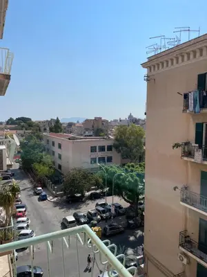 a view of a city from a balcony of a building at Casa Michela in Palermo