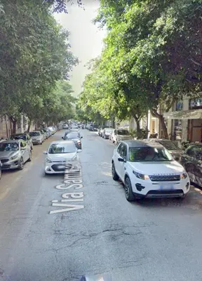 two cars parked on the side of a street at CasaVe in Palermo