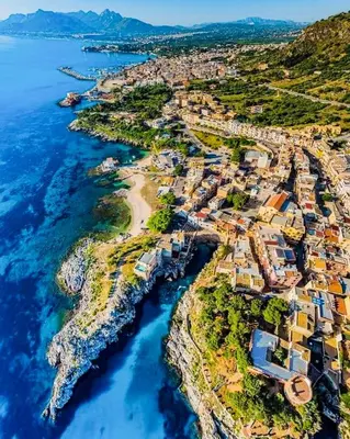 an aerial view of a town next to the ocean at Casa di Leda in Santa Flavia