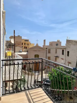 a balcony with a view of a city at Casa di Leda 1 in Santa Flavia