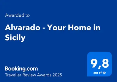 a blue screen with the words ahmado your home in safely at Alvarado - Your Home in Sicily in Carini