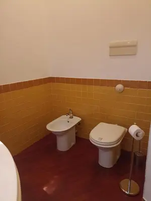 a bathroom with a toilet and a sink at A&C GOLD DIAMOND in Palermo