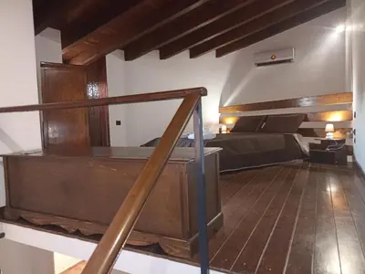 a room with a bed and a staircase in it at A&C GOLD DIAMOND in Palermo