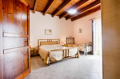 a bedroom with a bed in a room at GuestHost - Corso Garibaldi - Castellammare Central Flats in Castellammare del Golfo