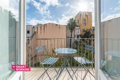 a bathroom with a sink and a shower at Casa Azul alla Cala by Wonderful Italy in Palermo