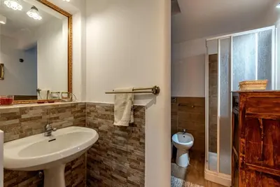 a bathroom with a sink and a toilet at Casa Goethe delle Volte by Wonderful Italy in Palermo