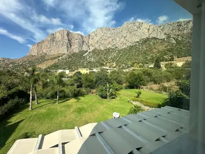 a view of a mountain from the balcony of a house at Villa Oasi Verde in Cinisi