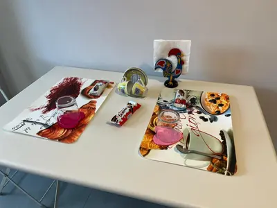 a white table with food and items on it at Wave house in Palermo