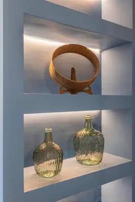 two vases sitting on a shelf with a bowl at Le Stanze di Triyah in Palermo