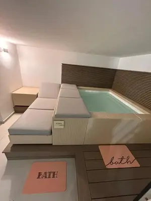 a room with a bed and a swimming pool at margot palermo in Palermo