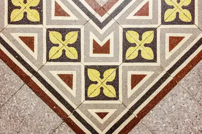 a floor with a mosaic pattern on a sidewalk at Kepos Rooms and Suites in Palermo