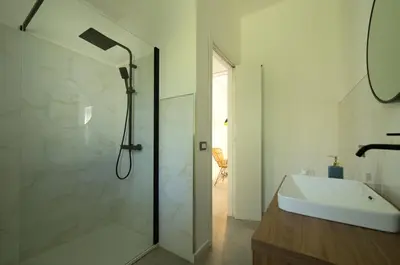 a bathroom with a shower and a sink at Villa Charme in San Vito lo Capo
