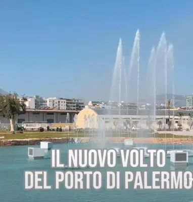 a view of a fountain with the words luviva violo del porto at Tuttoporto-Apartments LEVANTE in Palermo