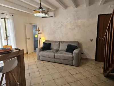 a living room with a couch and a table at VeraHouse in Palermo
