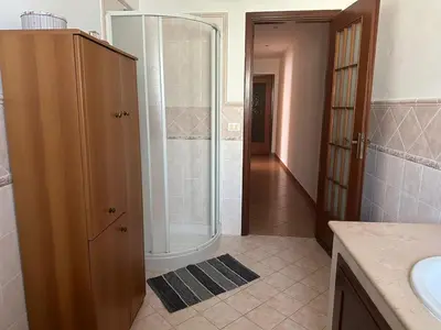 a bathroom with a shower and a sink at Casetta Sferracavallo in Palermo
