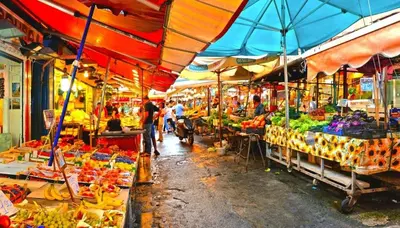 a market with a bunch of fruits and vegetables at Casa Mauro in Palermo
