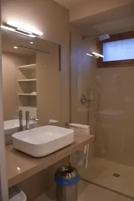 a bathroom with a white sink and a mirror at Caladdaura in Palermo