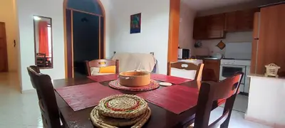 a kitchen with a wooden table with a bowl on it at Abba Palermo centro in Palermo