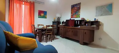 a kitchen with a table and a dining room at Abba Palermo centro in Palermo