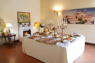 a buffet of food on a table in a room at Villa Lampedusa in Palermo