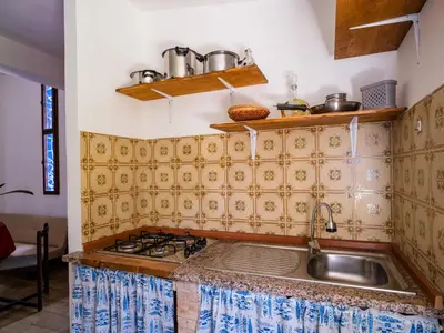 a kitchen with a sink and a stove at Apartment Sole by Interhome in Trappeto