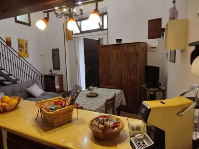 a living room with a couch and a table at BONELLUS in Palermo