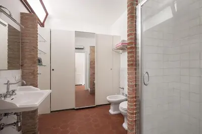 a bathroom with a sink and a toilet and a shower at Villa lady olimpia in Palermo
