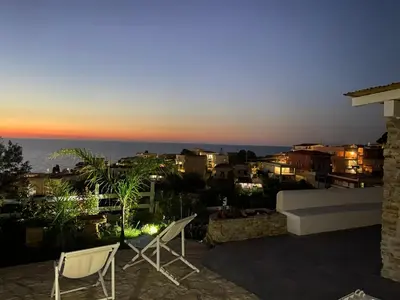 a view of the sunset from the balcony of a house at Addauro in Alcamo