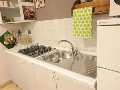 a kitchen with a sink and a stove at Dolce casa centro storico di Palermo new 2023 in Palermo