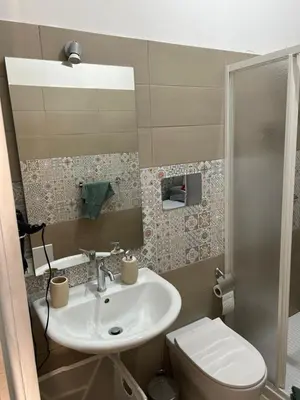a bathroom with a sink and a toilet at La Cupola - casa vacanze n 8 in Termini Imerese