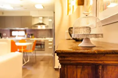 a lamp sitting on top of a wooden counter in a kitchen at Villa Lidia in Balestrate