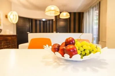 a bowl of fruit sitting on a table at Villa Lidia in Balestrate