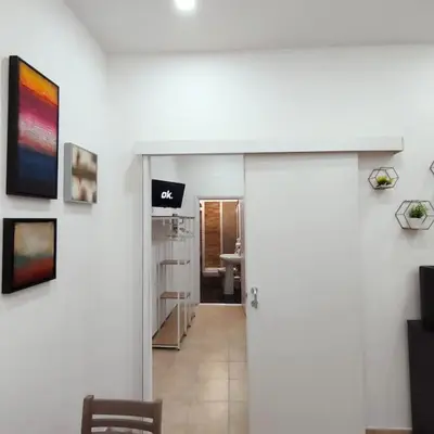 a hallway with a door to a room at La Casetta di Angy in Palermo