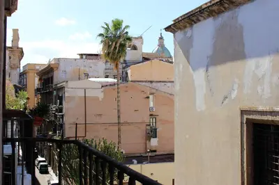 a view from the balcony of an apartment building at La Via delle Biciclette in Palermo
