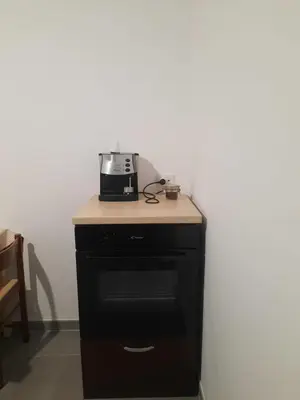 a appliance sitting on top of a kitchen counter at Domus Oreto in Palermo
