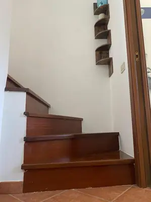 a set of stairs in a room with at Casamartú Apartment in Palermo