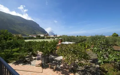 a view from a balcony of an apple orchard at Villa Paradiso in Castelluzzo