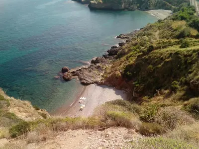 a view of a beach with boats on the water at Il Terrazzo Di Oleandri in Bagheria