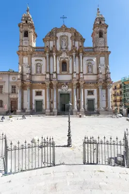 a church with a fence in front of it at Casa Valverde in Centro Storico by Wonderful Italy in Palermo