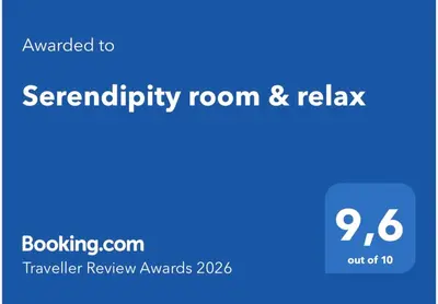 a blue sign that saystempering room and relax at Serendipity room & relax in Palermo