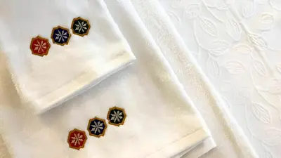 a group of gingerbread cookies on a white napkin at Heritage Collection Palermo B&B in Palermo